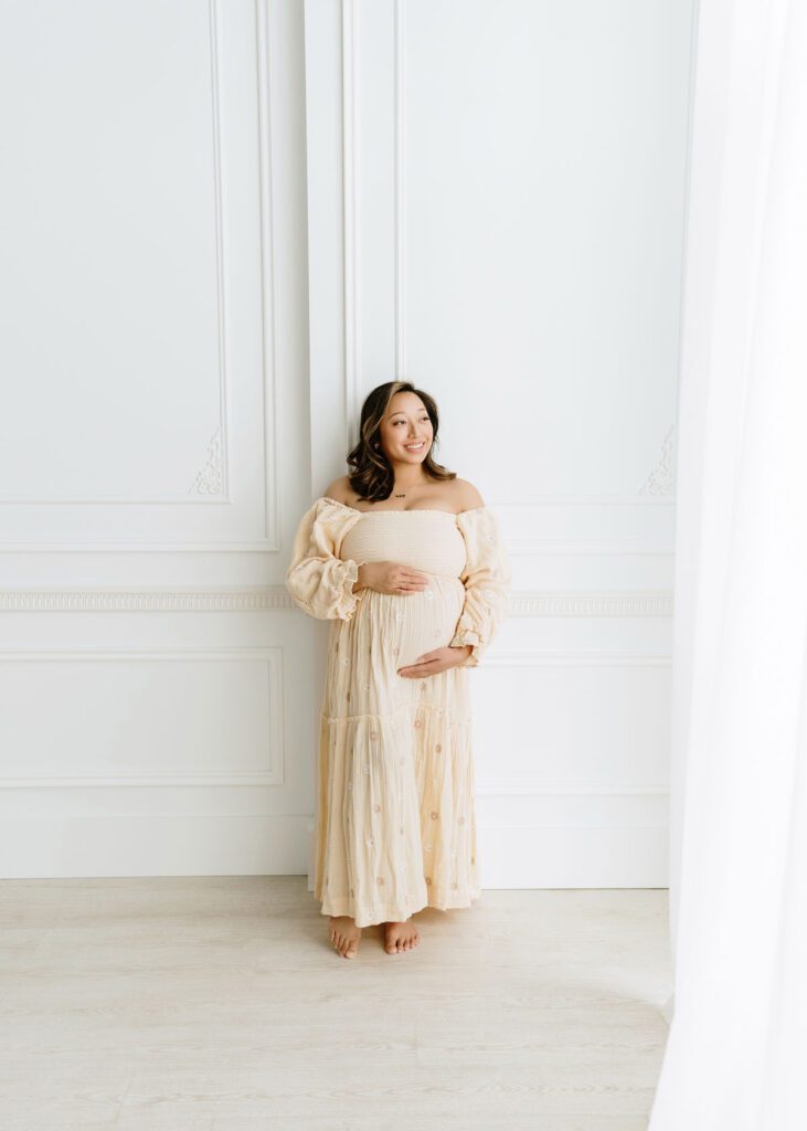 studio maternity photography Winnipeg couple waiting for baby