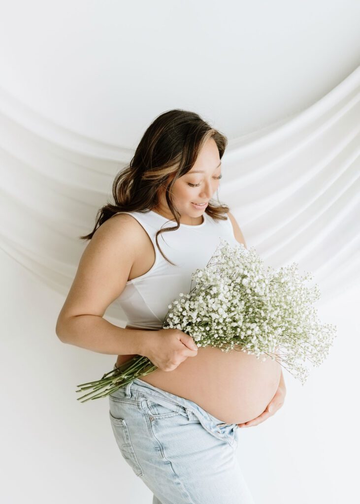 Winnipeg lifestyle maternity session soft light studio portrait