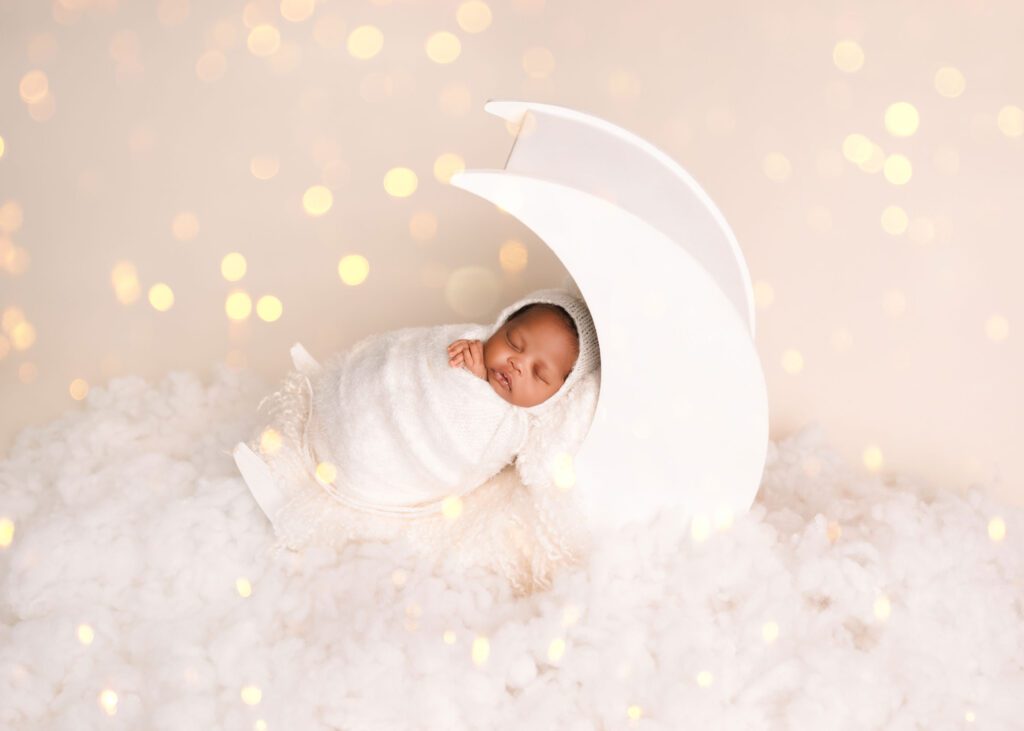 Baby only fully wrapped newborn photography with neutral tones in Winnipeg