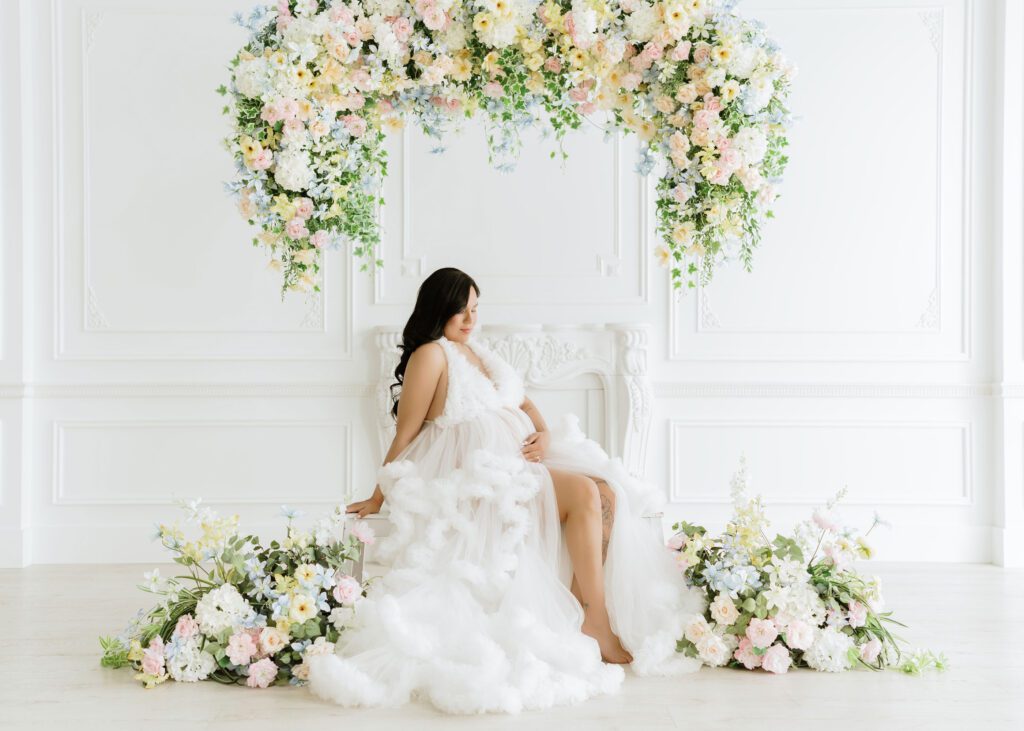 Professional maternity portrait with soft studio lighting in Winnipeg
