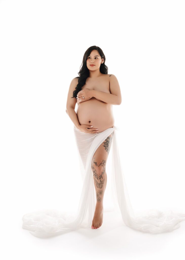 Expecting mother in an elegant studio maternity session in Winnipeg