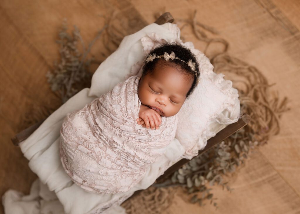 Classic fully wrapped newborn photography for baby only in Winnipeg