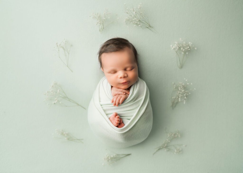 Wrapped newborn baby photography Winnipeg