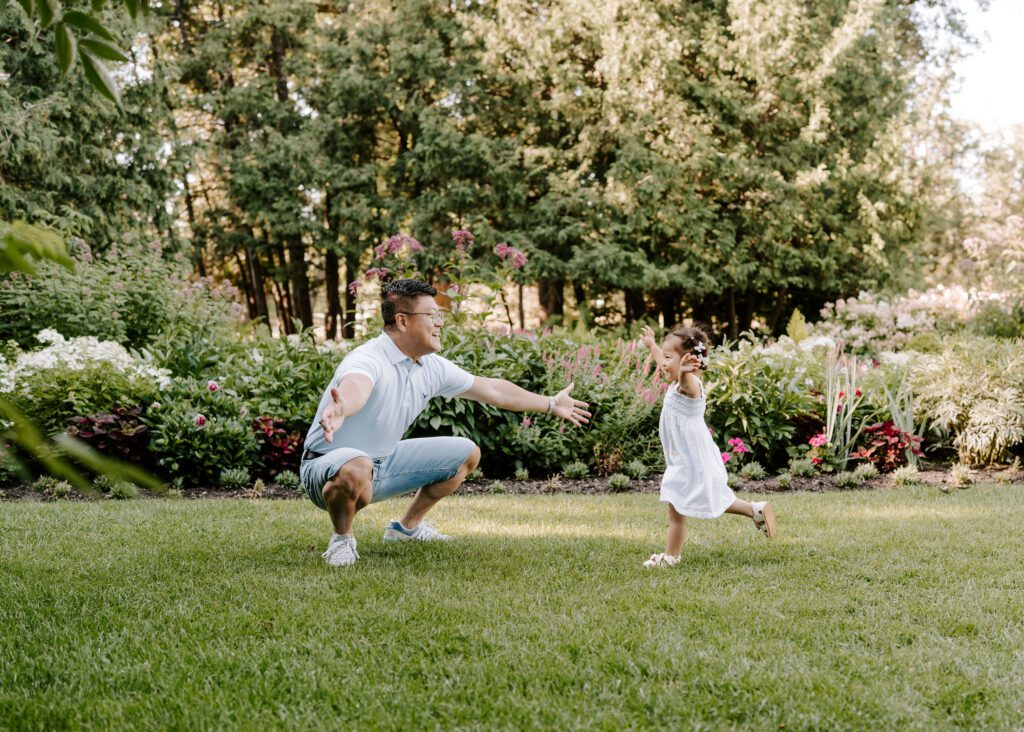 Candid family moment photographed outdoors in Winnipeg