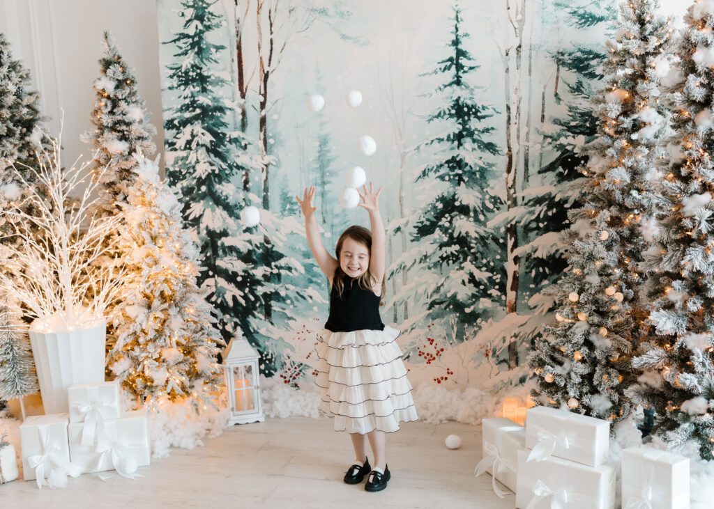 Christmas family portraits with elegant holiday decorations in Winnipeg